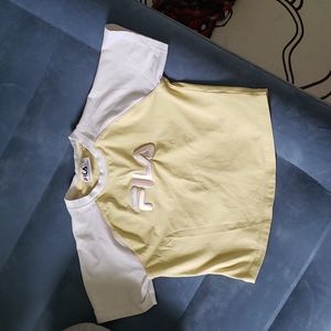 Large Fila cropped shirt w/ no holes or stains. Looks new. Only worn a few times